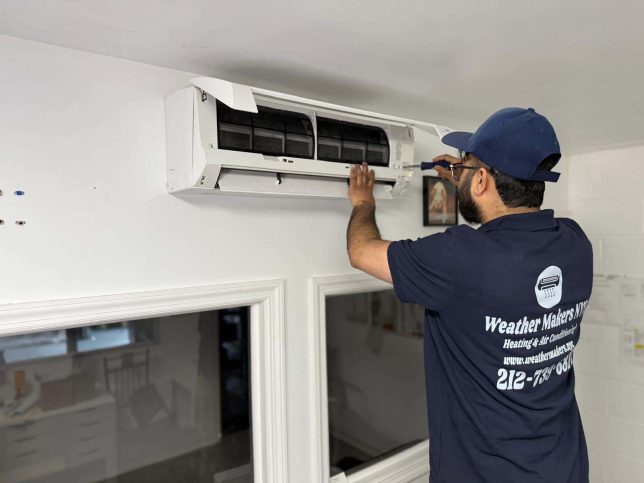 Technician repairing mini split system in New York City